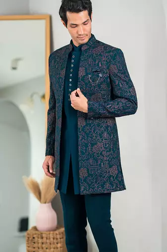 Peacock green indowestern with tranquil nature detailing thread and stone work