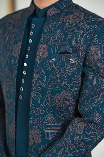 Peacock green indowestern with tranquil nature detailing thread and stone work