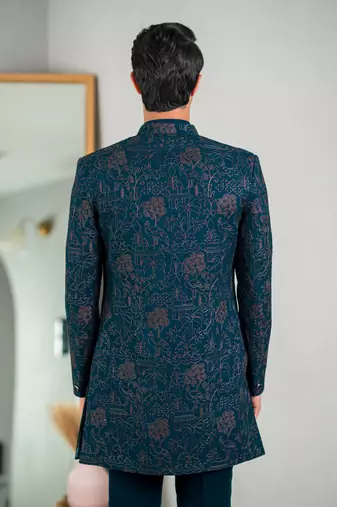 Peacock green indowestern with tranquil nature detailing thread and stone work