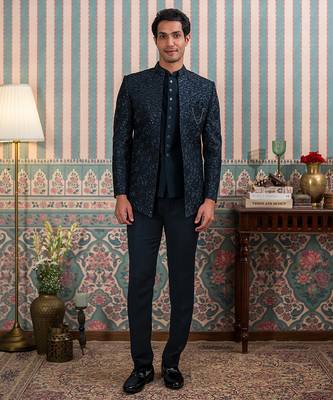 Deep green jodhpuri suit with sequins and thread work 1
