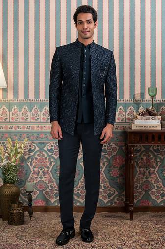 Deep green jodhpuri suit with sequins and thread work