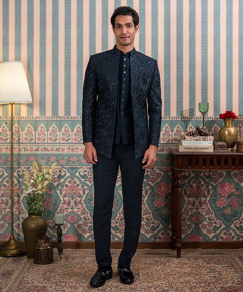 Deep green jodhpuri suit with sequins and thread work