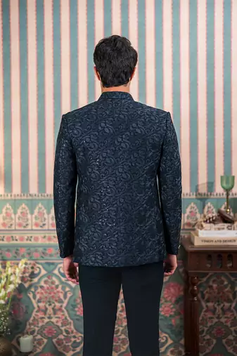 Deep green jodhpuri suit with sequins and thread work
