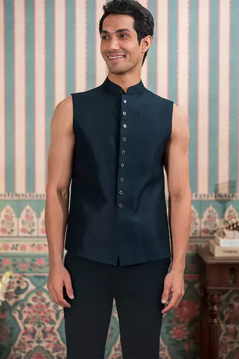 Deep green jodhpuri suit with sequins and thread work