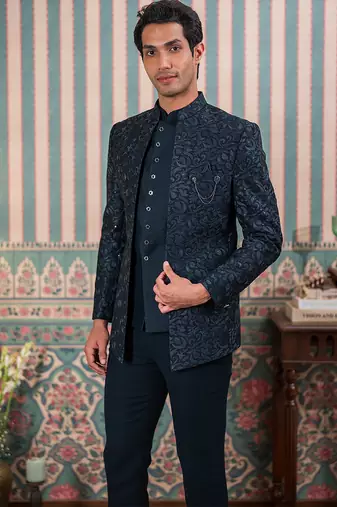 Deep green jodhpuri suit with sequins and thread work