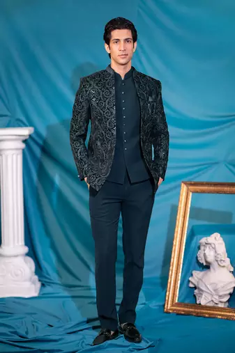 Green velvet jodhpuri suit with sequins and thread work