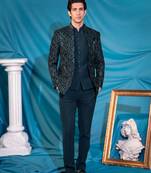 Green velvet jodhpuri suit with sequins and thread work