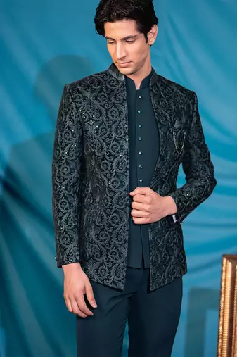 Green velvet jodhpuri suit with sequins and thread work