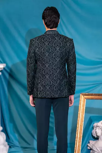 Green velvet jodhpuri suit with sequins and thread work
