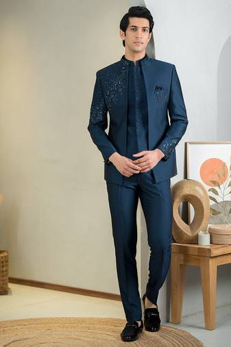 Blue jodhpuri suit with intricate floral hand embroidery
