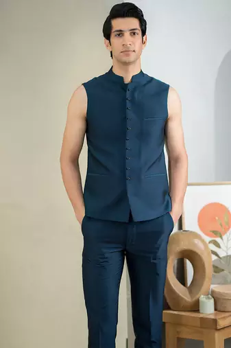 Blue jodhpuri suit with intricate floral hand embroidery