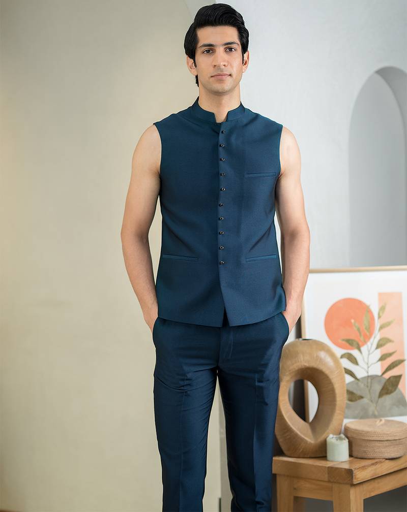 Blue jodhpuri suit with intricate floral hand embroidery