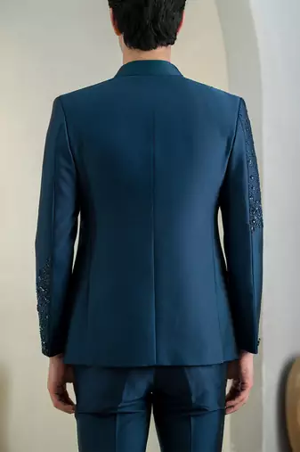Blue jodhpuri suit with intricate floral hand embroidery