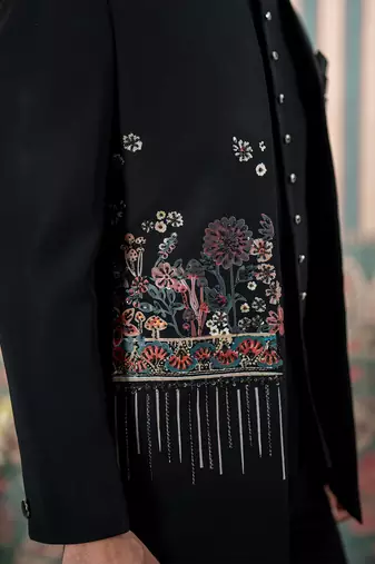 Black jodhpuri suit with floral rubber print and hand embroidery
