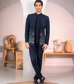 Navy blue jodhpuri suit with forest scenic rubber print and hand embroidery
