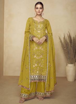 Mustard embroidered and handwork kurta palazzo suit 1