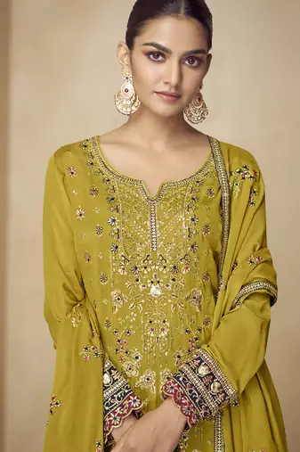 Mustard embroidered and handwork kurta palazzo suit