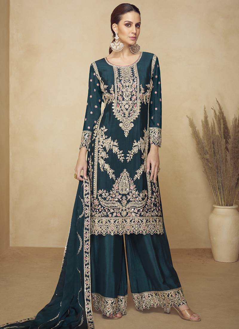 Aqua blue embroidered and handwork kurta palazzo suit