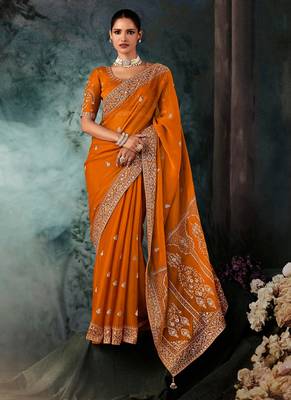 Orange  fancy hand work border with heavy designer blouse  wedding wear saree 1