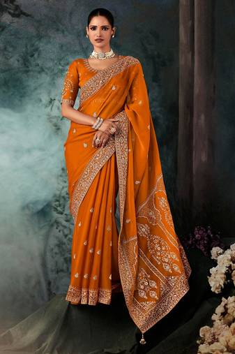 Orange  fancy hand work border with heavy designer blouse  wedding wear saree