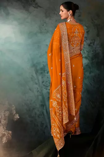 Orange  fancy hand work border with heavy designer blouse  wedding wear saree