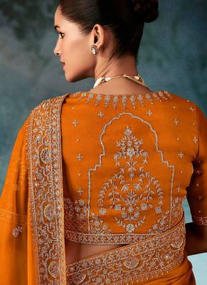 Orange  fancy hand work border with heavy designer blouse  wedding wear saree 3