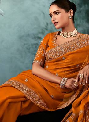 Orange  fancy hand work border with heavy designer blouse  wedding wear saree 4