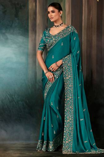 Teal fancy hand work border with heavy designer blouse  wedding wear saree