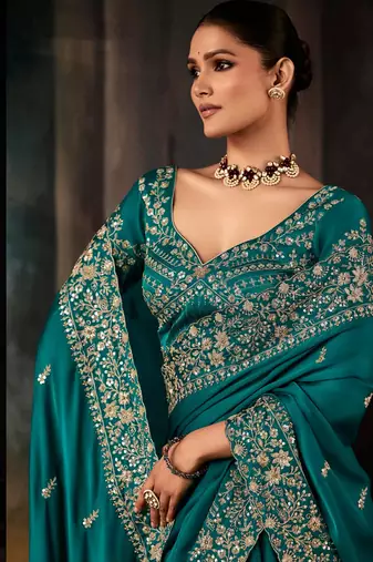 Teal fancy hand work border with heavy designer blouse  wedding wear saree