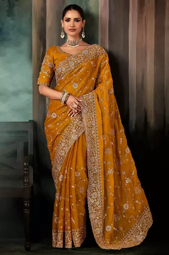 Mustard  fancy hand work border with heavy designer blouse  wedding wear saree