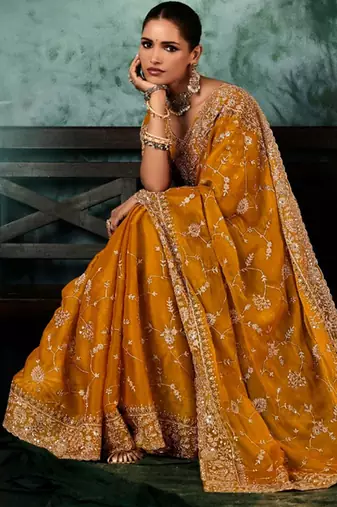 Mustard  fancy hand work border with heavy designer blouse  wedding wear saree