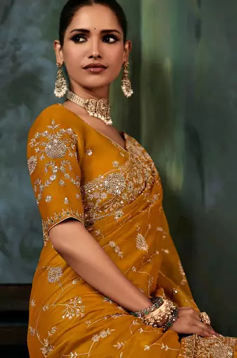 Mustard  fancy hand work border with heavy designer blouse  wedding wear saree