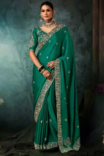 Peacock green fancy hand work border with heavy designer blouse  wedding wear saree