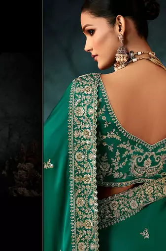 Peacock green fancy hand work border with heavy designer blouse  wedding wear saree