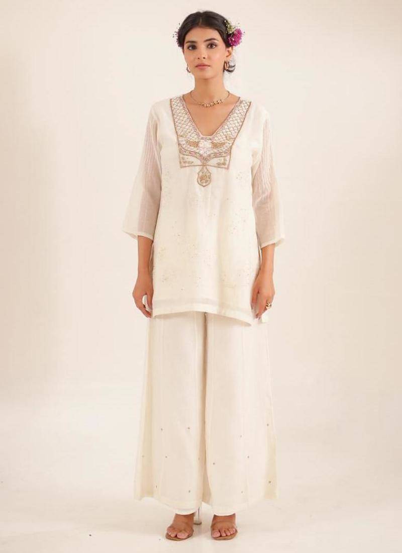 White matsya top and palazzo set