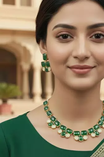 Golden plated precious stone necklace set with green quartz & pearl drops
