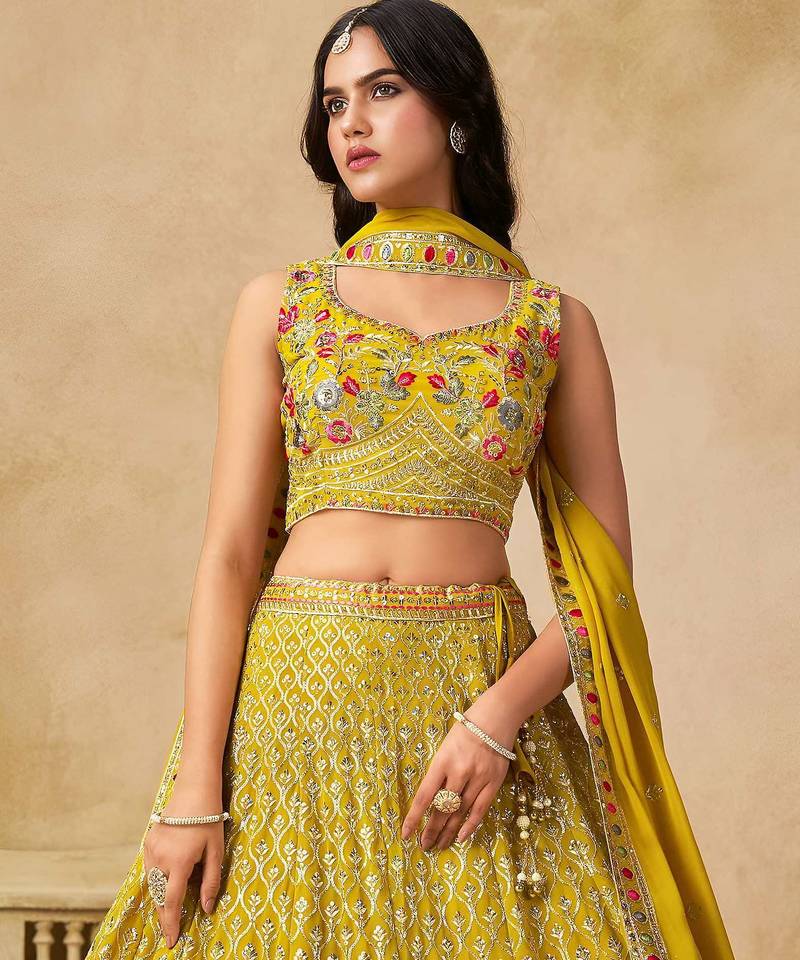 Yellow Zari Embroidered Georgette Haldi Wear Lehenga Choli