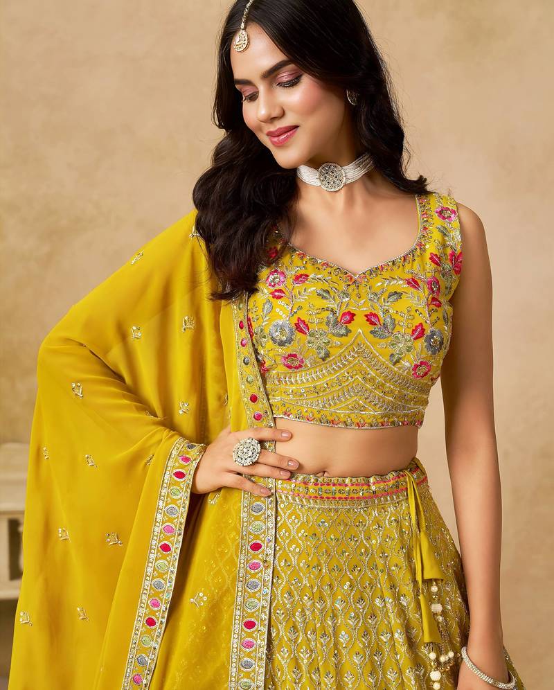 Yellow Zari Embroidered Georgette Haldi Wear Lehenga Choli