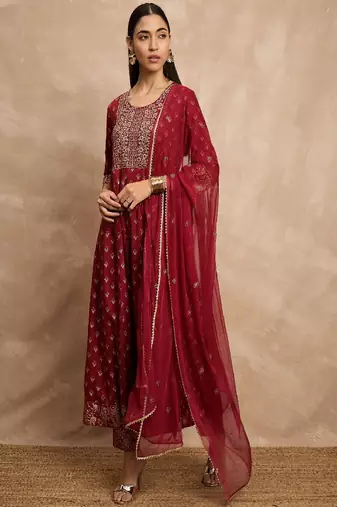 Maroon color ethnic motifs embroidered anarkali kurta with trousers & dupatta