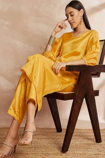 Yellow color v-neck three-quarter sleeves puffed sleeves a-line kurta with trousers