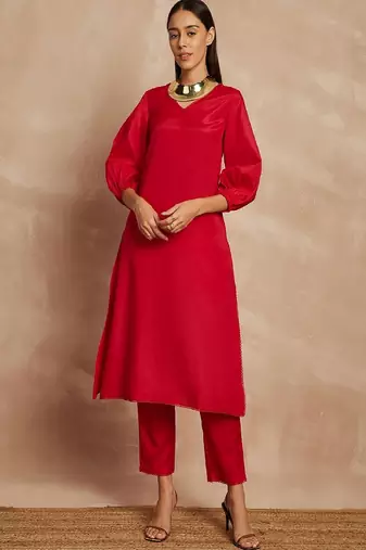 Red color v-neck three-quarter sleeves puffed sleeves a-line kurta with trousers