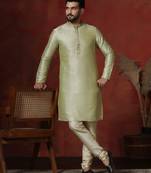 green dupion kurta pyjama set for men with solid design