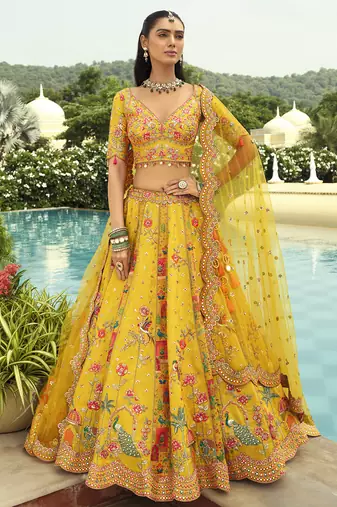 yellow silk embroidered & art mirror work wedding wear lehenga choli