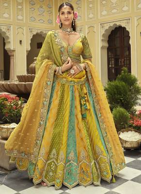 yellow silk embroidered & art mirror work wedding wear lehenga choli 1