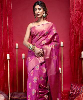 Banarasi kora organza silk saree in magenta color with copper zari floral motifs 1