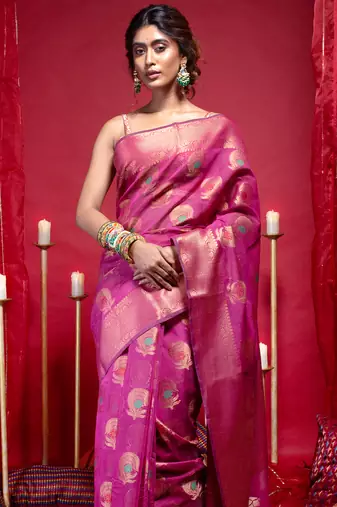 Banarasi kora organza silk saree in magenta color with copper zari floral motifs