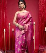 Banarasi kora organza silk saree in magenta color with copper zari floral motifs