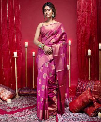 Banarasi kora organza silk saree in magenta color with copper zari floral motifs 2
