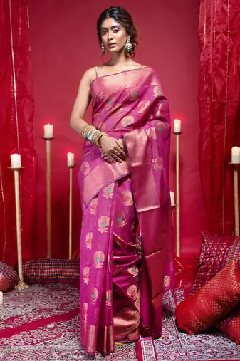 Banarasi kora organza silk saree in magenta color with copper zari floral motifs