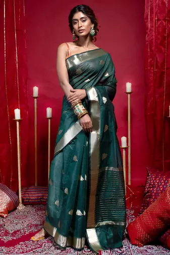 Banarasi kora organza saree in green color with triangle zari motifs and border